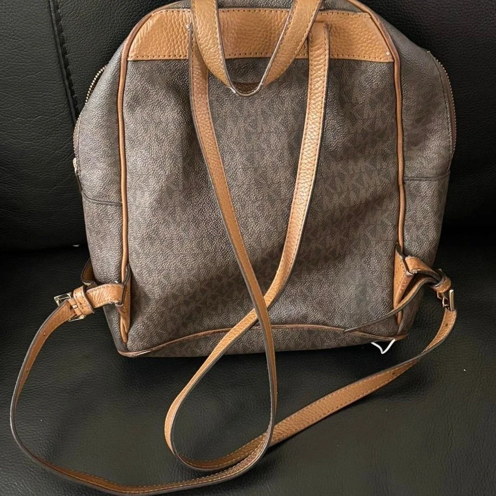 Michael‎ Kors brown monogram backpack purse with gold hardware